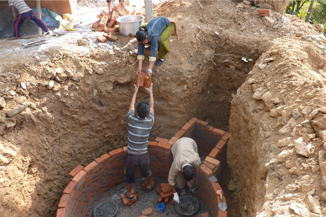 Bio-gas construction underway with community participation for Healthabitat's Nepal Sanitation Program.