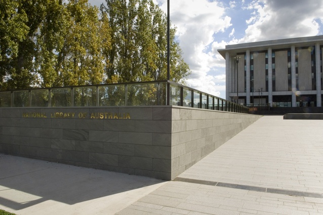 The refurbished NLA forecourt showing new walling and balustrade, and paved tilted plane which accentuates the verticality of the NLA facade on approach.