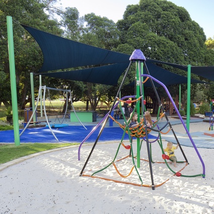 Children ‘hang out’ on the climbing frame.