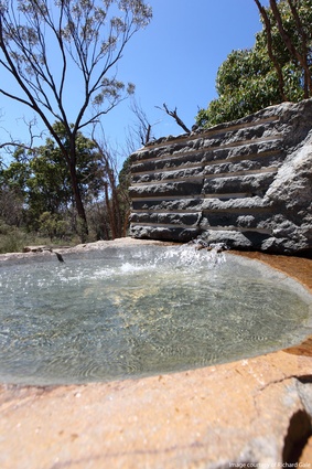 The creative use of water adds a significant tactile element to the site.