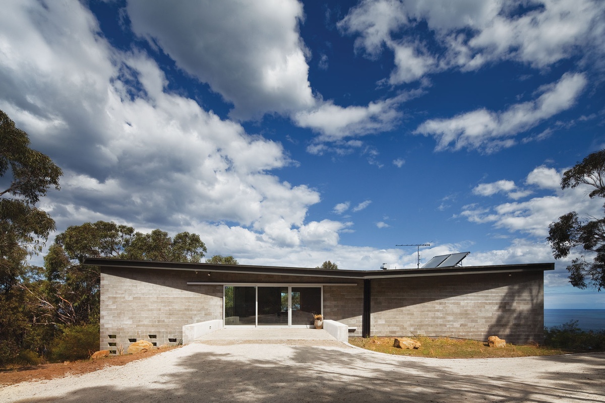 The street-facing façade of the beach house.