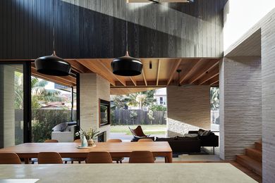 A layering of indoor and outdoor spaces defines the spatial arrangement of this coastal Sydney home.
