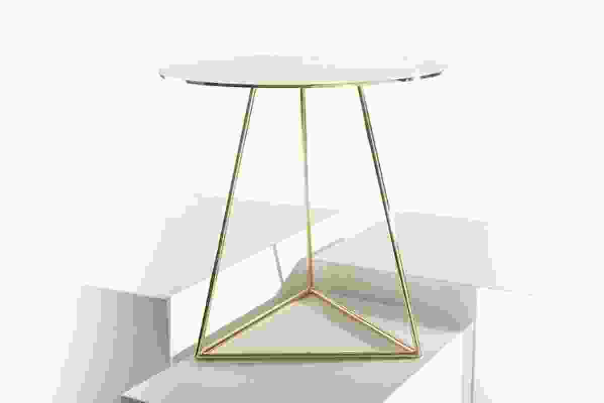 The GEO side table in full brass.