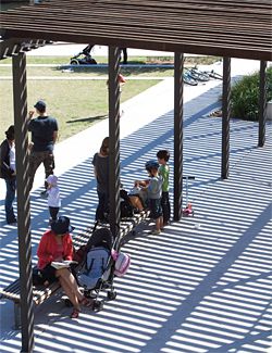 Three battened shade pavilions have been created within the former Water Police site in Pyrmont. Image: Brett Boardman