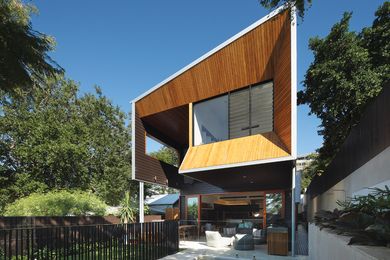 The rear elevation of the Chisel House has a sense of drama to it, with an elevated stage over the garden and pool area below.