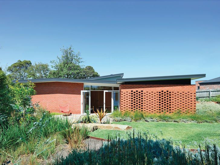 A reworked roofline at Frankston Midcentury Modern (2018) subtly improves the home.