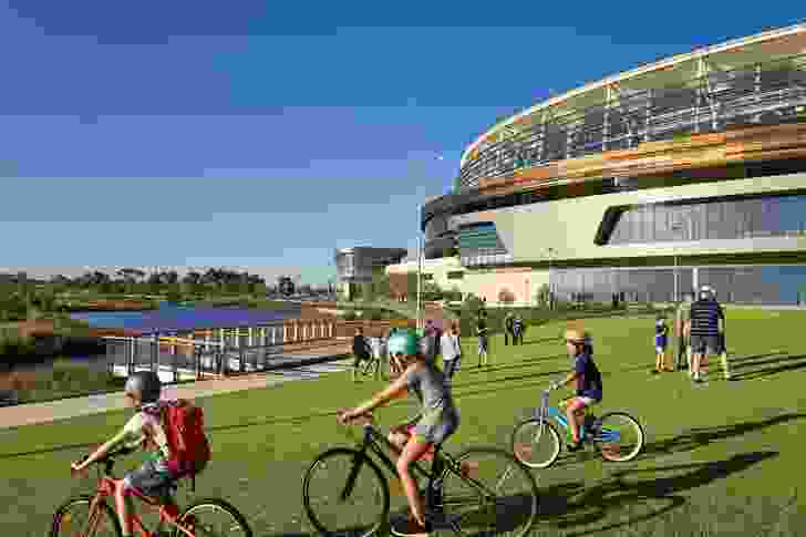 A network of walking and cycling trails weaves through the site, providing connections to the river and CBD.