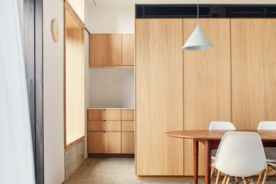 Inside, Henson Park House features a simple palette of timber and concrete.