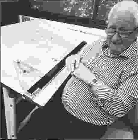 Co-founder of Clarke Hopkins Clarke, Les Clarke, at the drawing board.