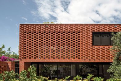  A contemporary twist on traditional Flemish bond brickwork makes for a highly textured facade.
