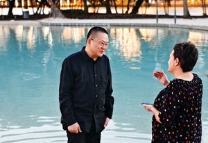 Wang Shu talks with Helen Norrie at Brisbane’s artificial beach.