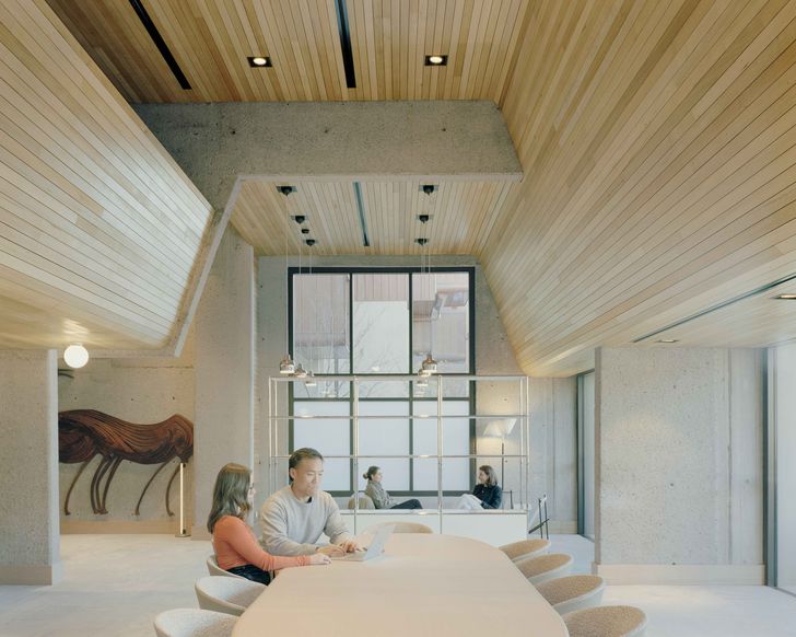 The communal Phillip Room houses restored original timber bison sculptures designed by architect Penny Rosier.