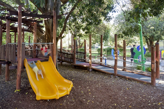 The boardwalk/tree house provides universal access to the top of the double slide.
