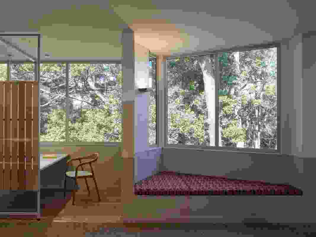 Panoramic windows provide views of the rainforest to the rear of the library and give the building an open-ended feel.