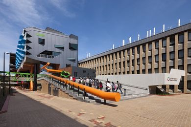 The elevated “processional” staircase to the entry concourse.