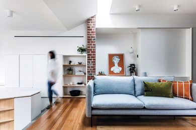 Aligned with a shift in floor level, a narrow skylight marks the point at which the addition and existing house adjoin. Artwork: Jai Vasicek.