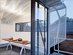 The
top of the stair and
dining area seen from
the dining deck.