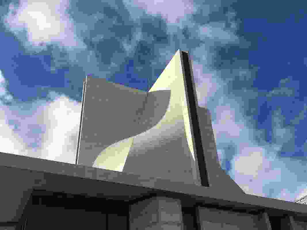 The concrete roof shell structure is a monolithic hyperbolic paraboloid.