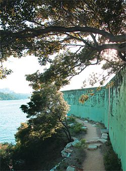 Flying metal stair running between the foreshore and a concrete cliff. Image: Christian Borchert