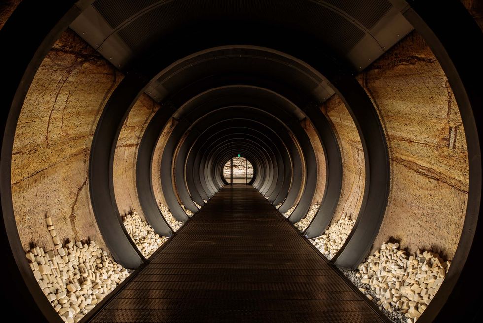 Fender Katsalidis completes subterranean ‘tunnel to nowhere’ at MONA ArchitectureAu