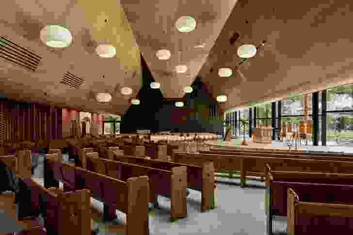 The overall organization of pews and seats is arranged as a collection of seating groups, placing an intermediate scale between the individual and the group. 
