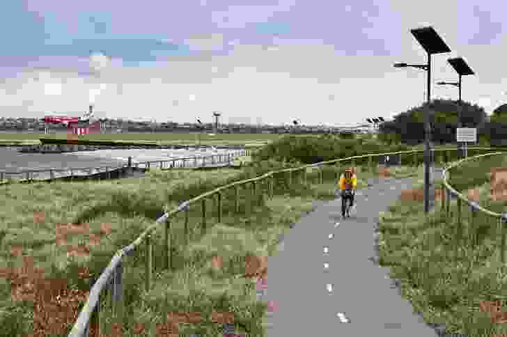 Foreshore beach rehabilitation work includes extensive revegetation and shared path networks.