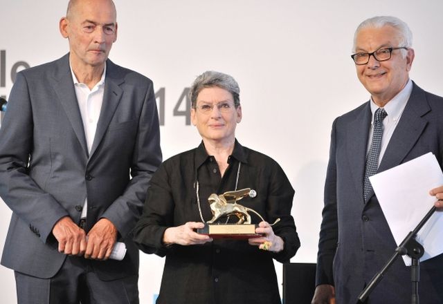 Architect Phyllis Lambert recieves the Golden Lion award for lifetime achievement at the 14th International Architecture exhibition in Venice on Saturday 7 June. Lambert is flanked by Rem Koolhaas (left) and Paolo Baratta.