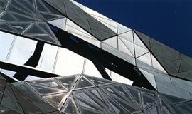 Sections of the facade pattern removed to give access to views and light. Image: Trevor Mein.