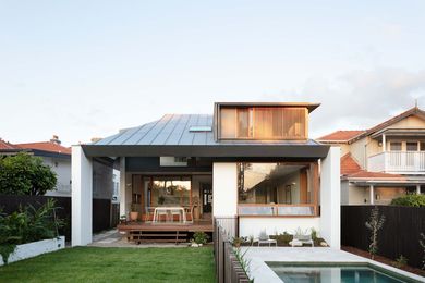 The zinc-clad roof is a coherent device used to control climate and privacy.