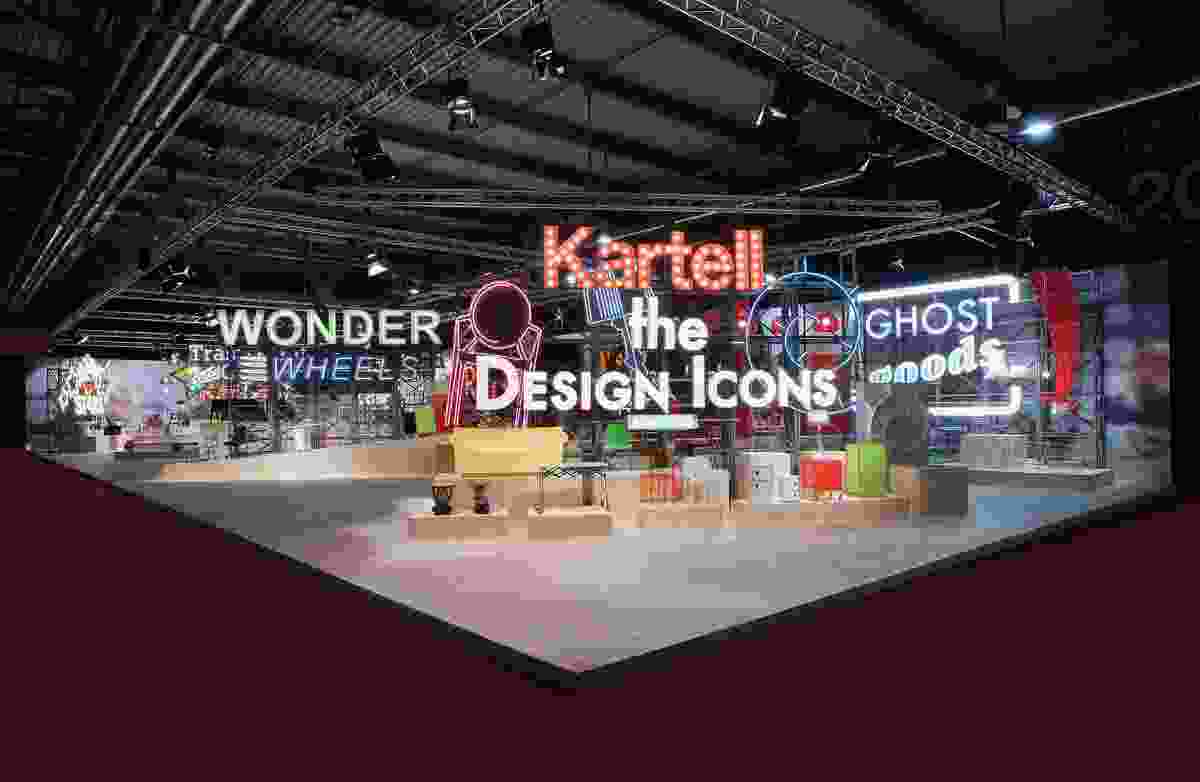 The Kartell stand at the fair teamed timber and neon lighting.