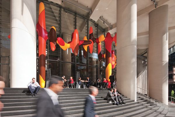 The north-facing steps at 1 Bligh Street (Architectus and Ingenhoven Architects) in Sydney open up the building to the street and provide a public seating area that is warm in winter but cool in summer. Artwork: James Angus, Day In, Day Out, 2011.