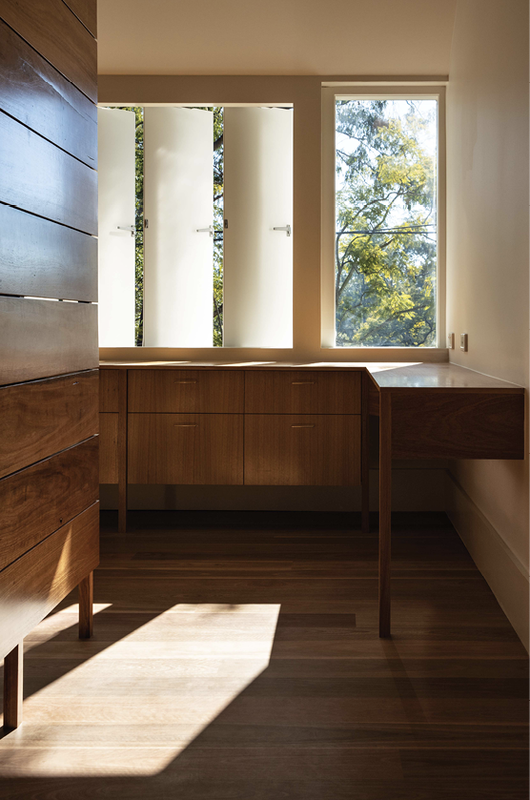 An extensive timber-lined dressing room adjoining the front bedroom and ensuite elevates daily domestic rituals.