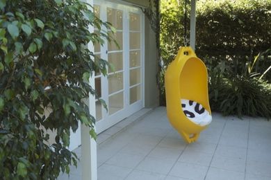 Marine Buoy hanging chair by Deck.