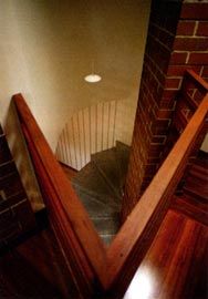 Looking down the stair in the front apartment.