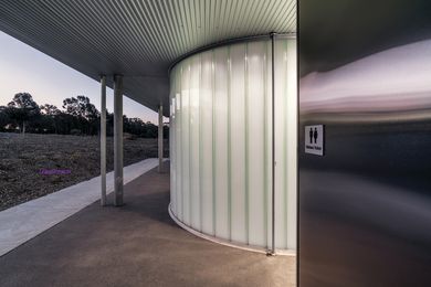The design of Jock Comini Reserve Amenities (2019) in regional Victoria, by Kerstin Thompson Architects, caters for diverse cultural and gender preferences while prioritizing safety.