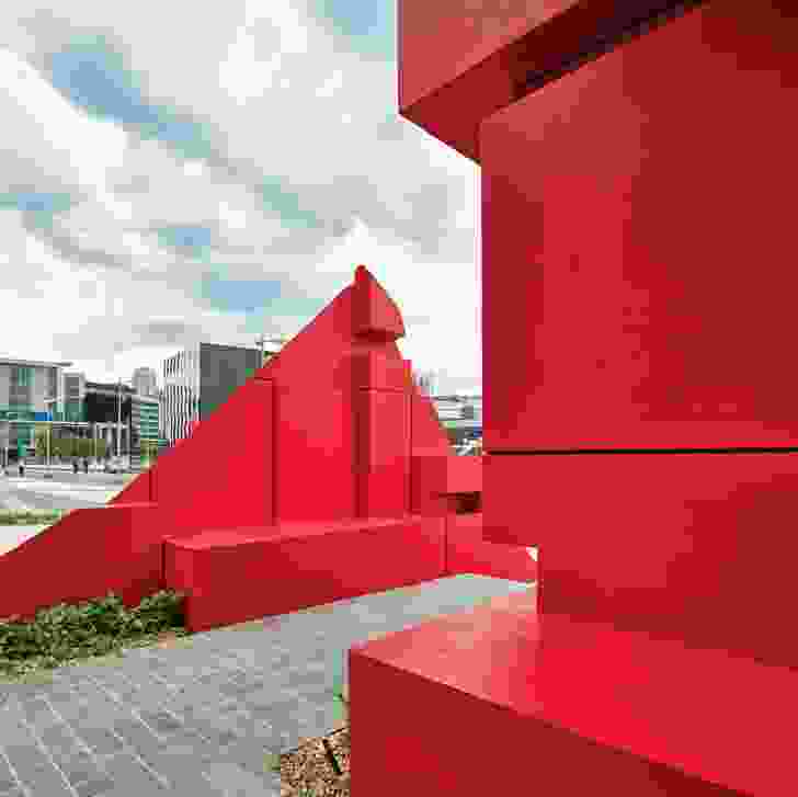 The raw concrete shells are lined with colourful “filling”, which offer ledges on which to sit, rest or play.