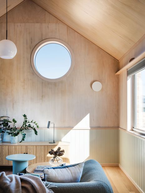 Trauma-informed design principles have resulted in homes characterised by timber, organic forms and natural light.