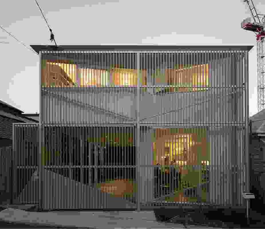 An aluminium screen permits visual connection between the house and the neighbourhood.