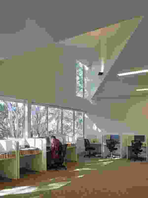 Panoramic windows provide views of the rainforest to the rear of the library and give the building an open-ended feel.