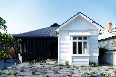 The front door was moved from the front to the side of the house.