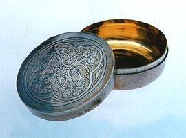 Silver pyx (c.1841-43), for consecrated bread, decorated with wheat and vine motifs, symbolic of bread and wine of the eucharist. Made by Hardman. Photos Tasmanian Museum and Art Gallery.