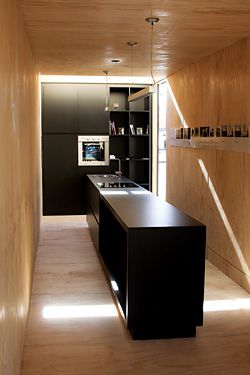 Interior of Room 11’s MODV 2.0, a converted shipping container which is intended for living in.