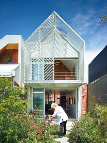 This lattice controls overlooking and conceals the awning that shades the ground floor patio.