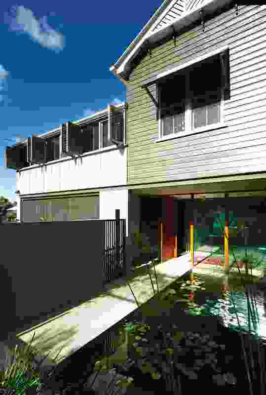 Integrating ponds into the Bulimba House emphasises the transition from the street to the shade of the house.