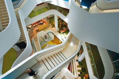 Natural light reaches deep into the building through the atrium.