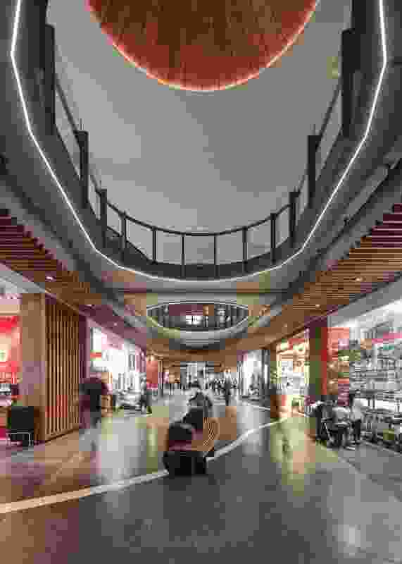 Undulations in the eco mall design echo movement and form gathering spaces.
