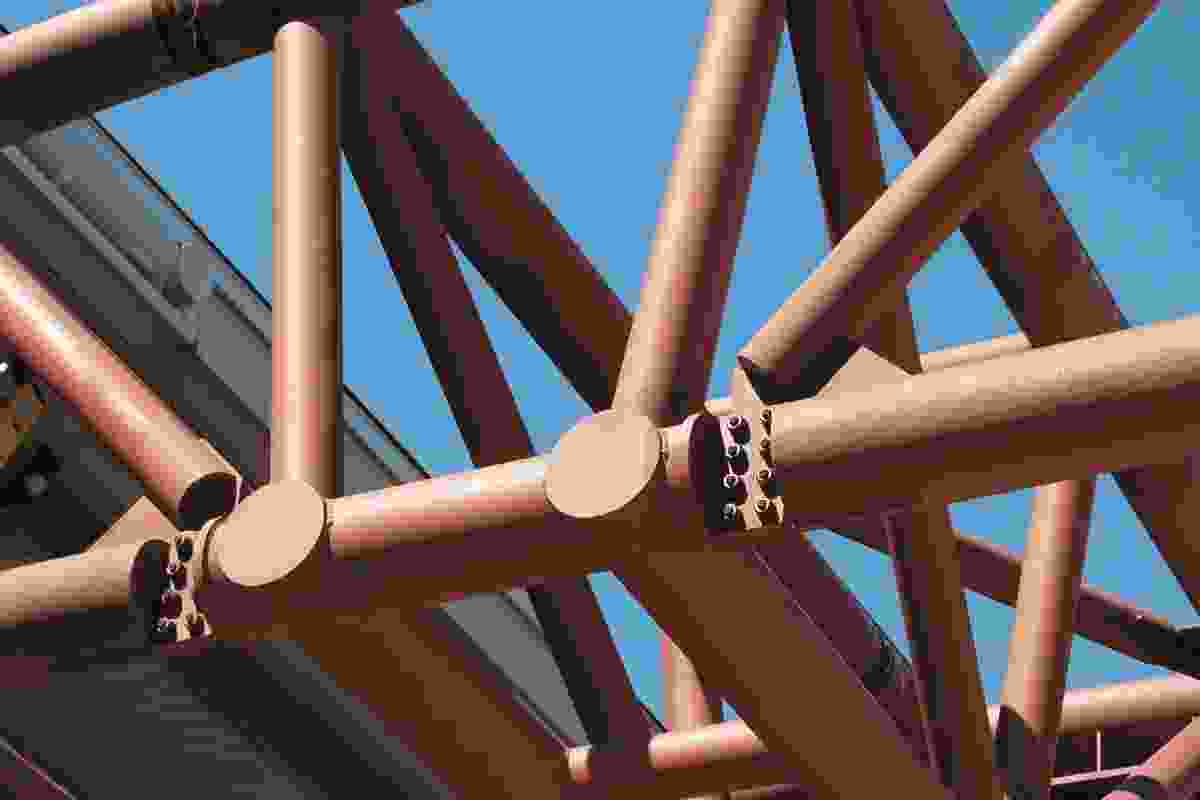 Wide-flange sections with simple connections to support the roof overhang.