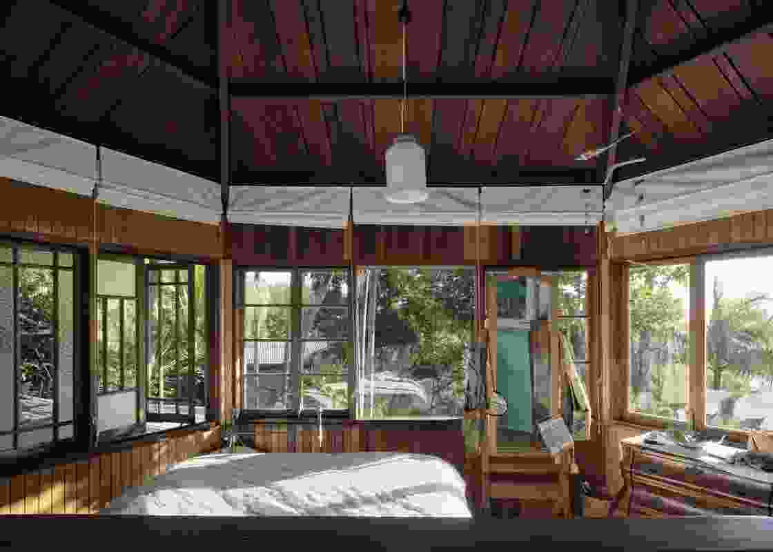 An elevated bedroom is evocative of a childhood treehouse.