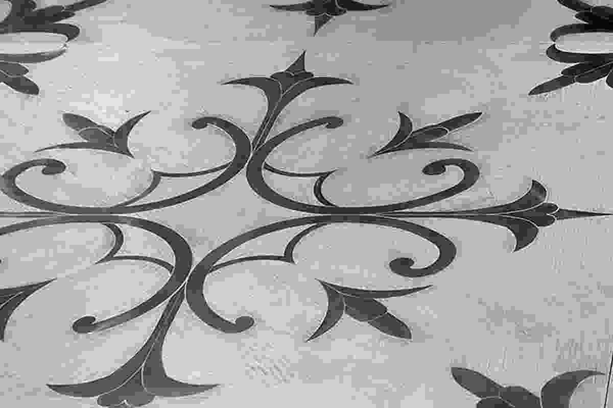 Tuscania oak and steel inlaid flooring from Vassalletti.