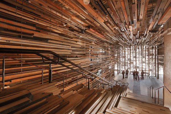 Designed by March Studio, Hotel Hotel's dramatic entry stair was constructed from more than 2150 pieces of recycled timber.